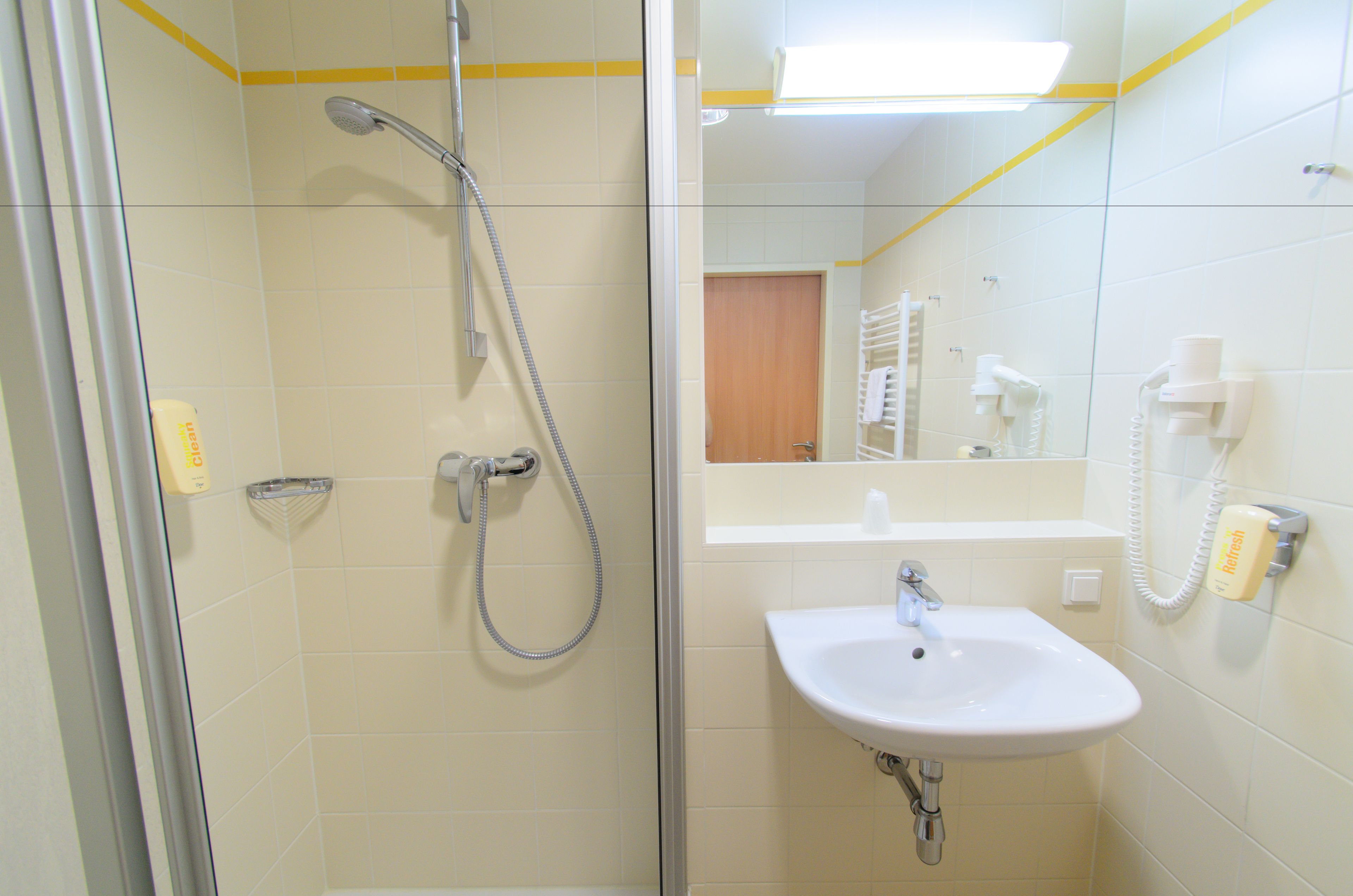 shower, free toiletries, hair dryer, towels