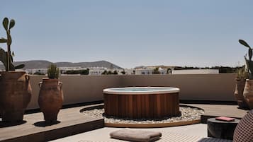 Penthouse ejecutivo | Tina de hidromasaje privada