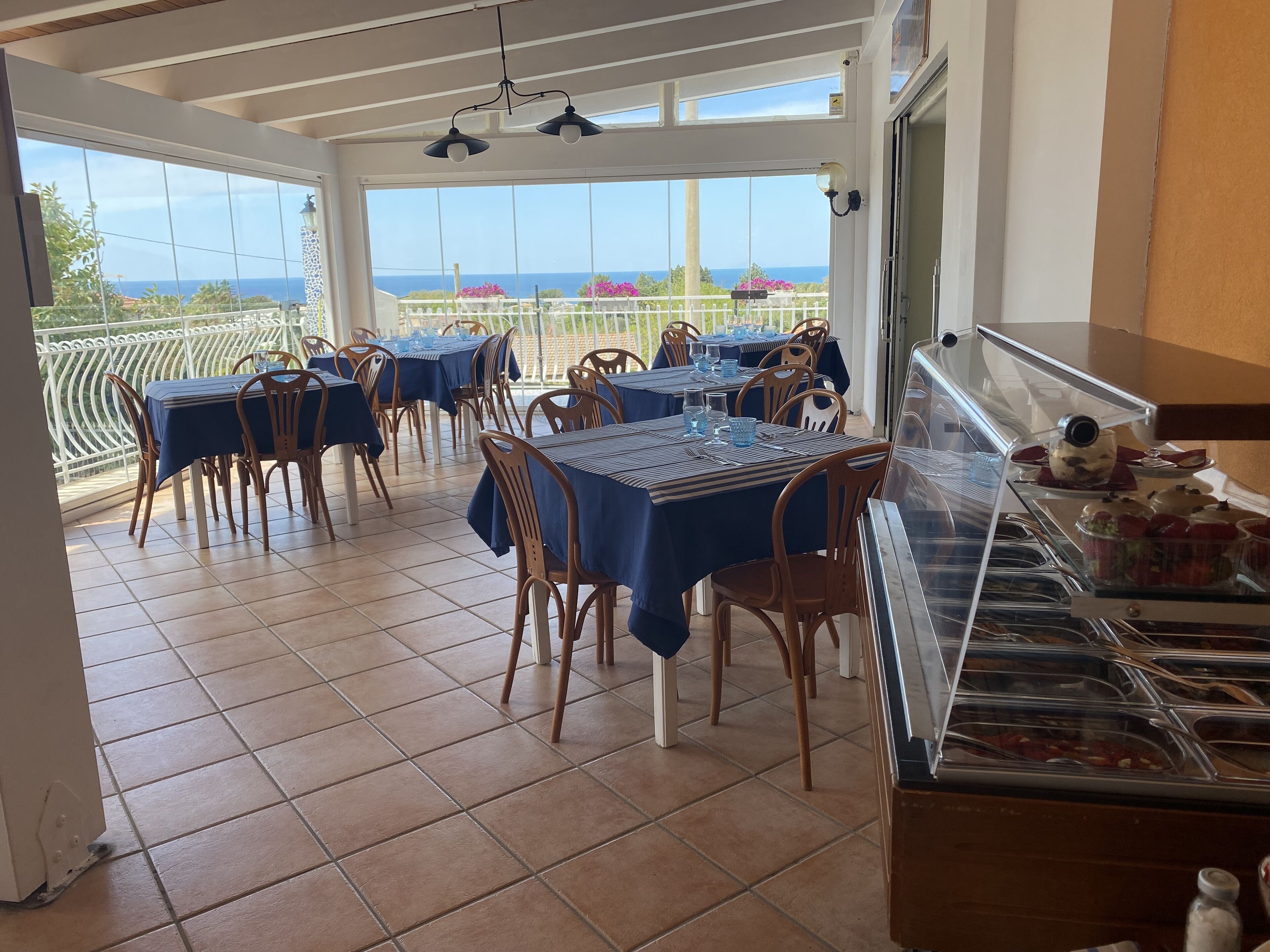 Breakfast, lunch, dinner served; local cuisine, sea views 
