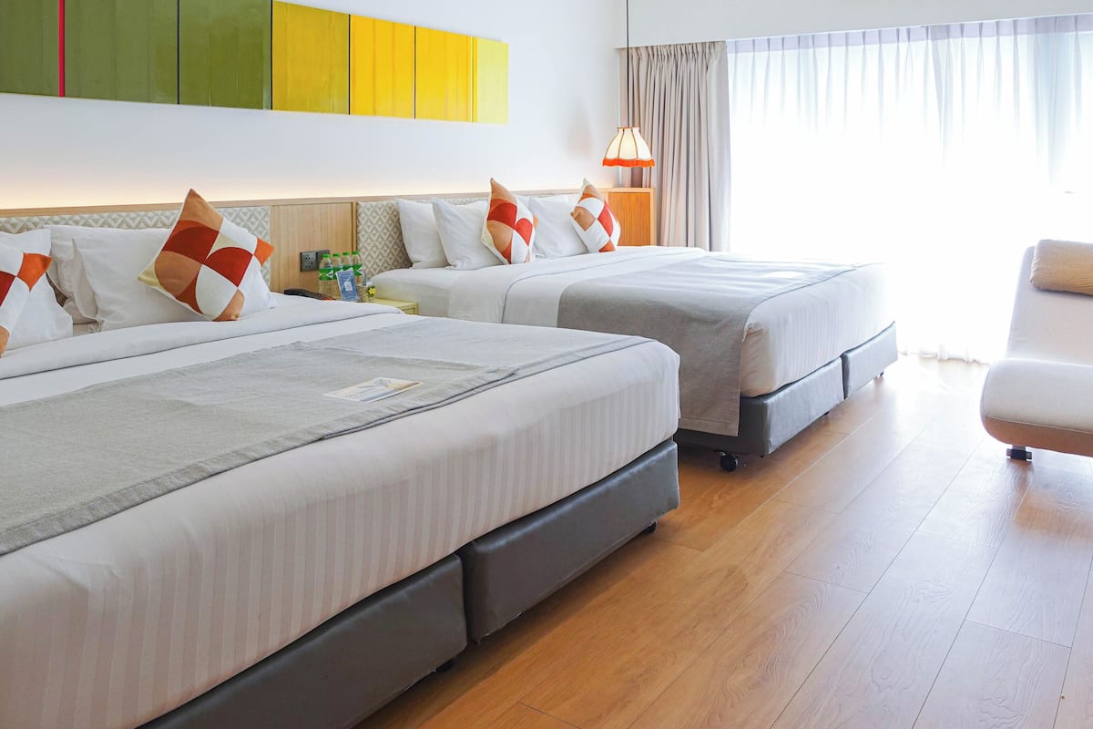 Family Quadruple Room | Premium bedding, minibar, in-room safe, individually decorated