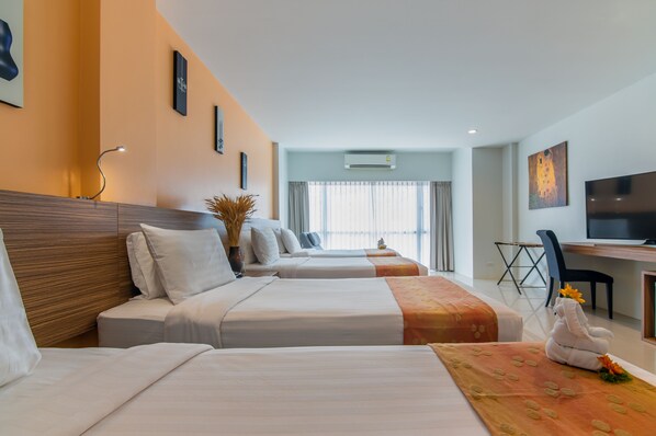Quadruple Room (4 People) | Premium bedding, minibar, in-room safe, individually decorated
