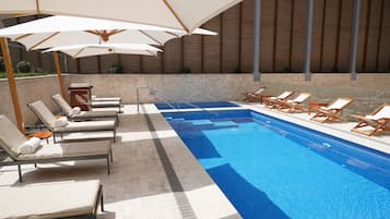 Outdoor pool, sun loungers