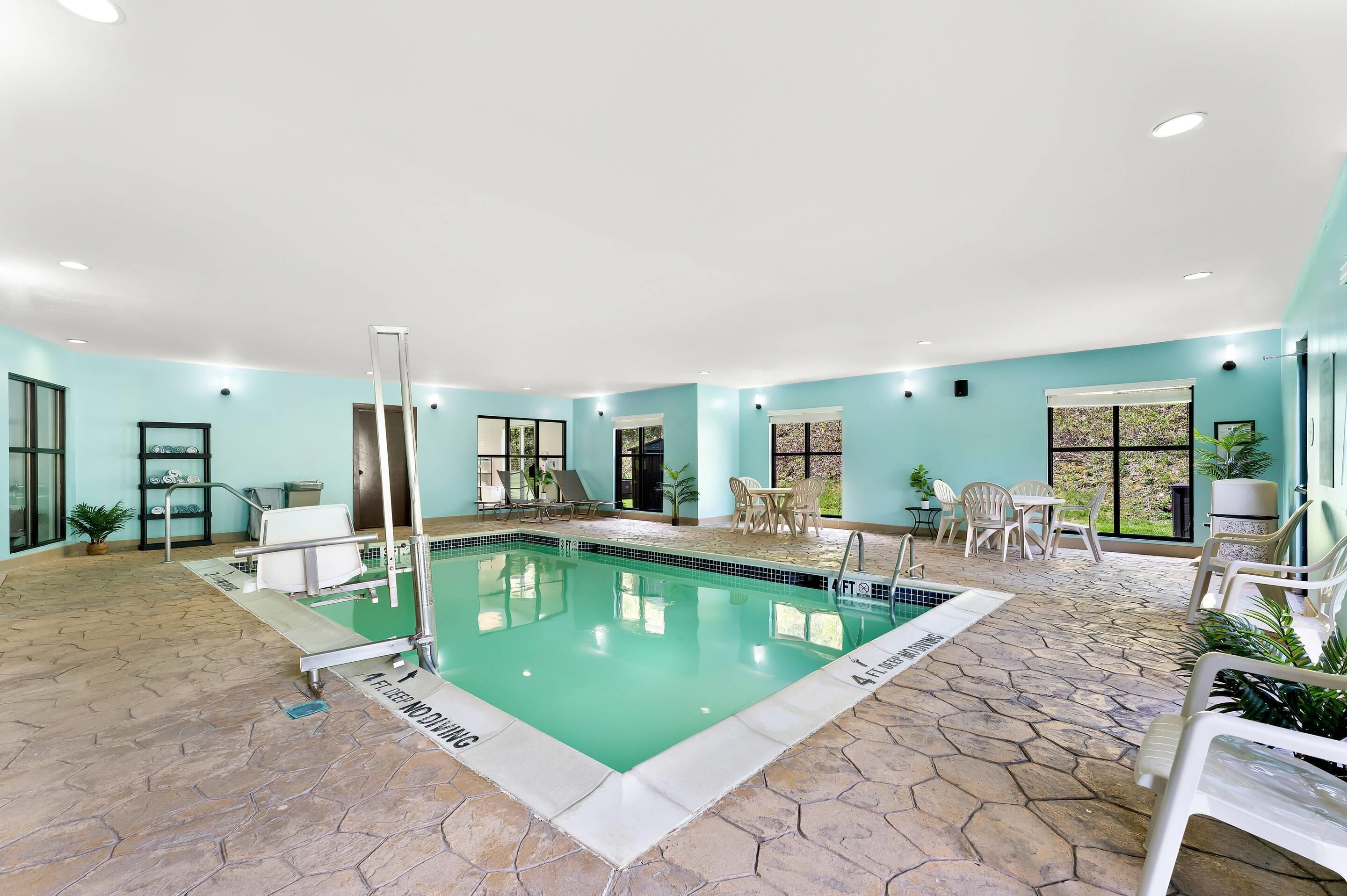 Indoor pool, open 6 AM to 11 PM, pool loungers