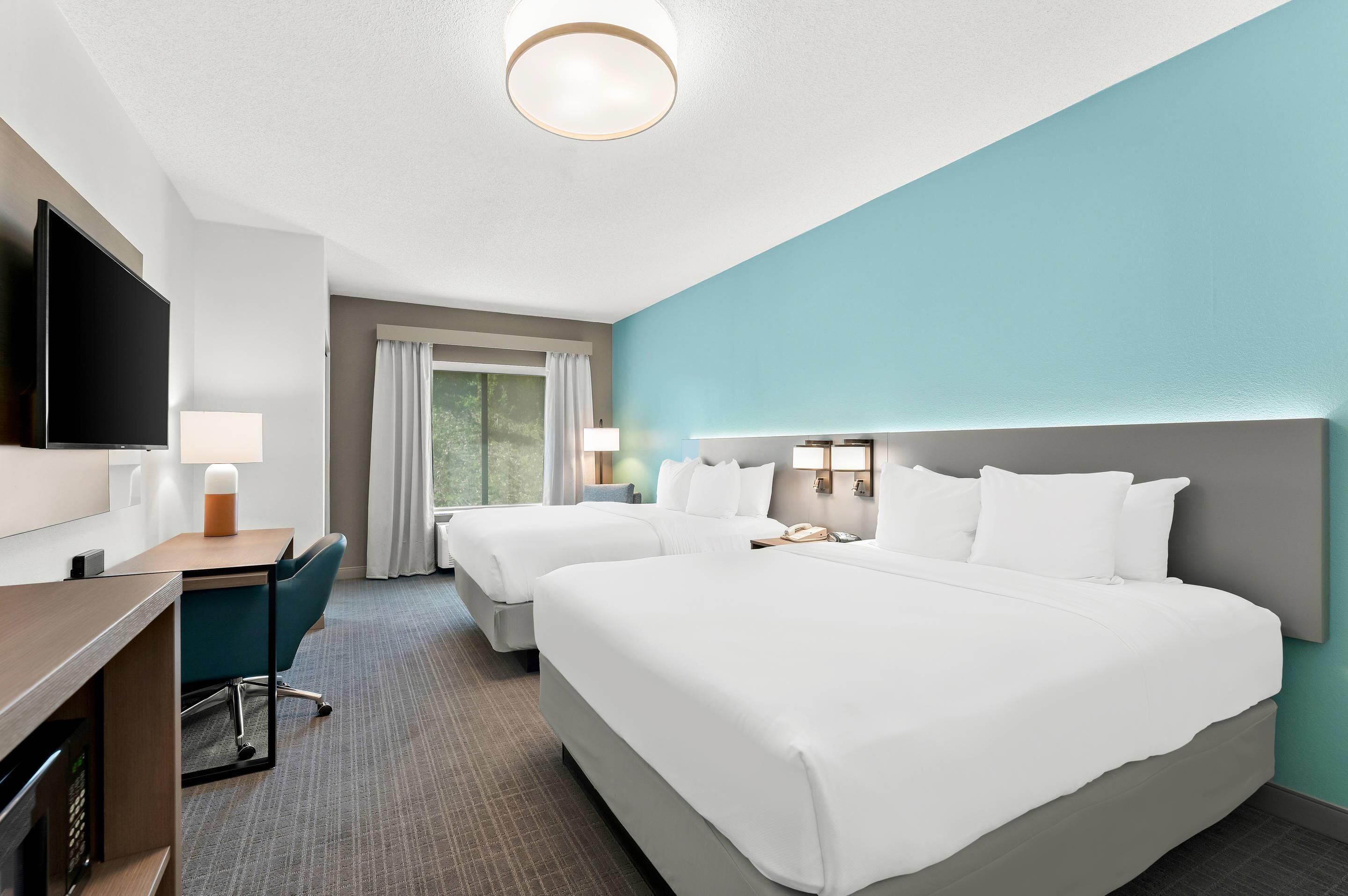 Standard Room, 2 Queen Beds, Non Smoking | In-room safe, desk, laptop workspace, iron/ironing board