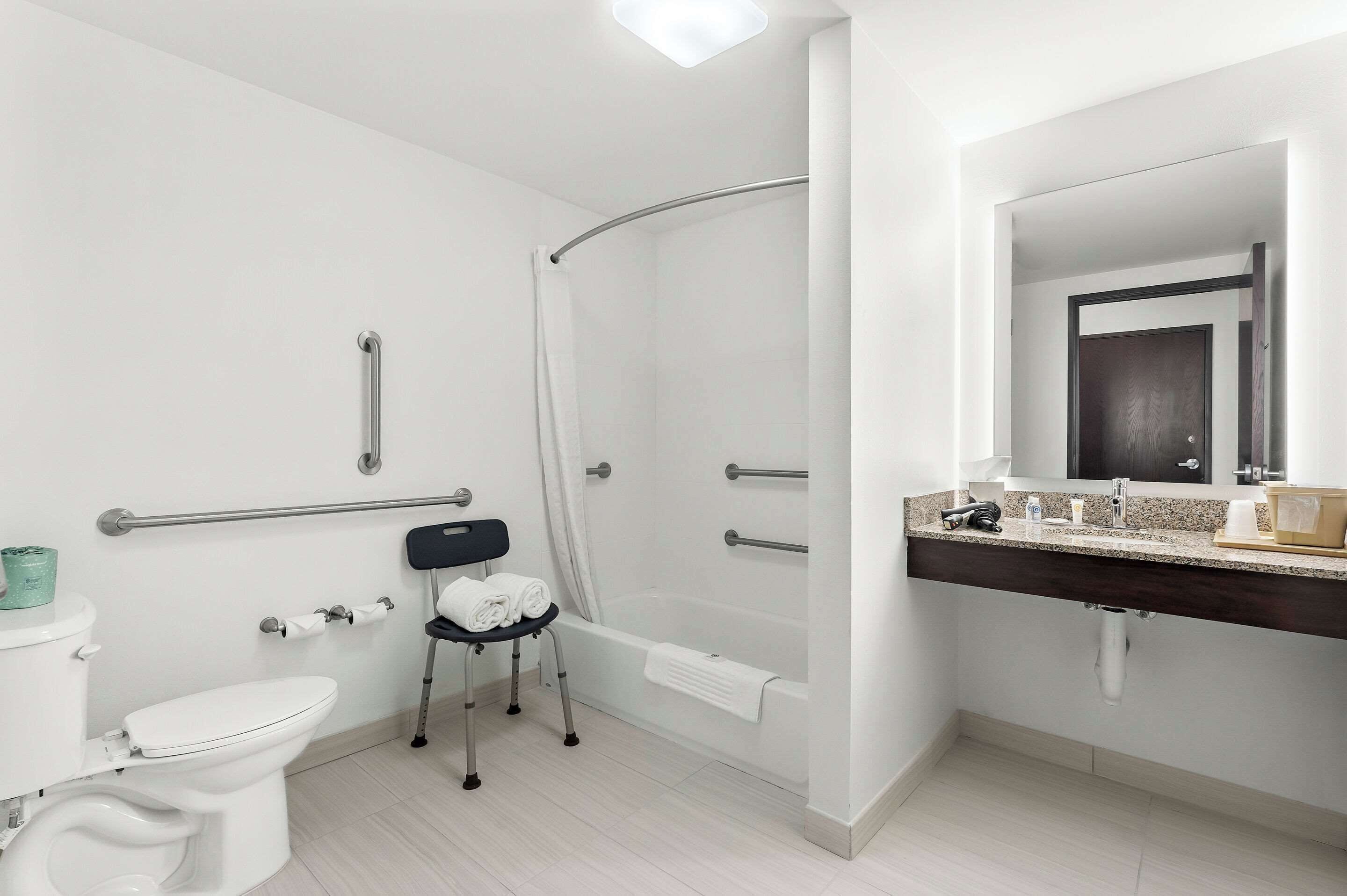 suite, 1 king bed with sofa bed, non smoking, hot tub | bathroom | hair dryer, towels