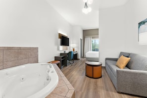 Suite, 1 King Bed with Sofa bed, Non Smoking, Hot Tub | In-room safe, desk, laptop workspace, iron/ironing board