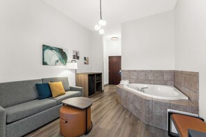 Suite, 1 King Bed with Sofa bed, Non Smoking, Hot Tub | In-room safe, desk, laptop workspace, iron/ironing board
