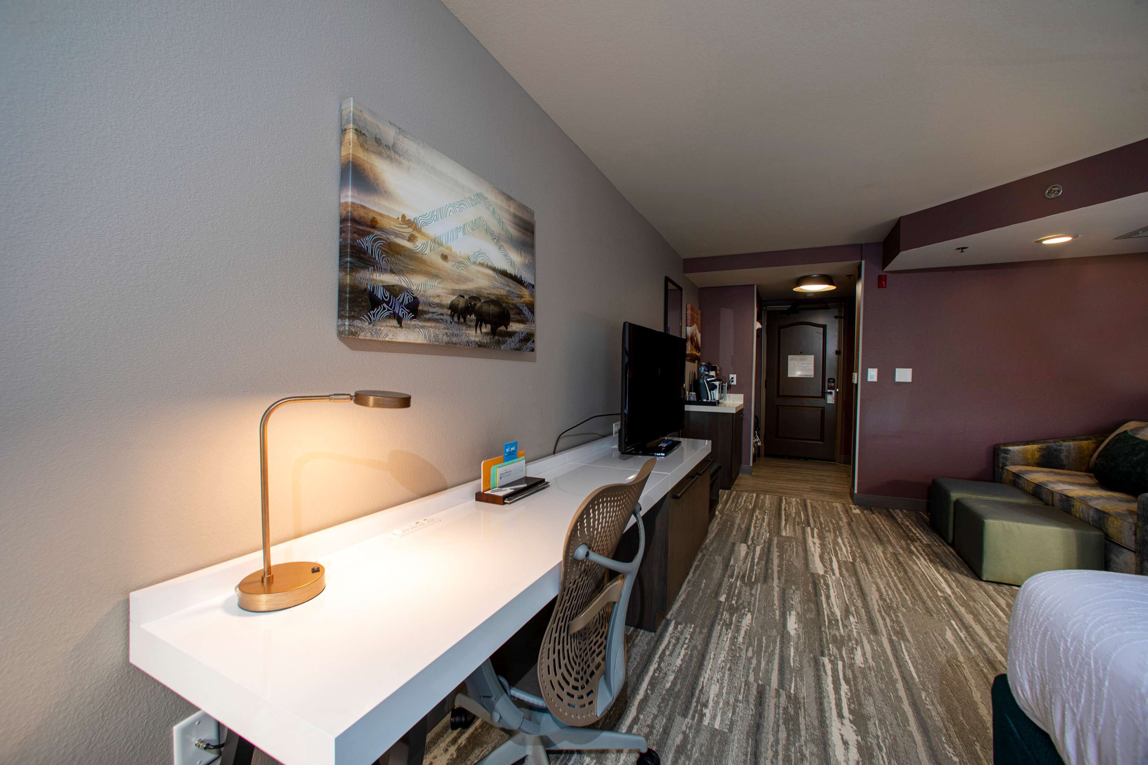 deluxe room, 1 king bed with sofa bed | in-room safe, desk, iron/ironing board, free cots/infant beds