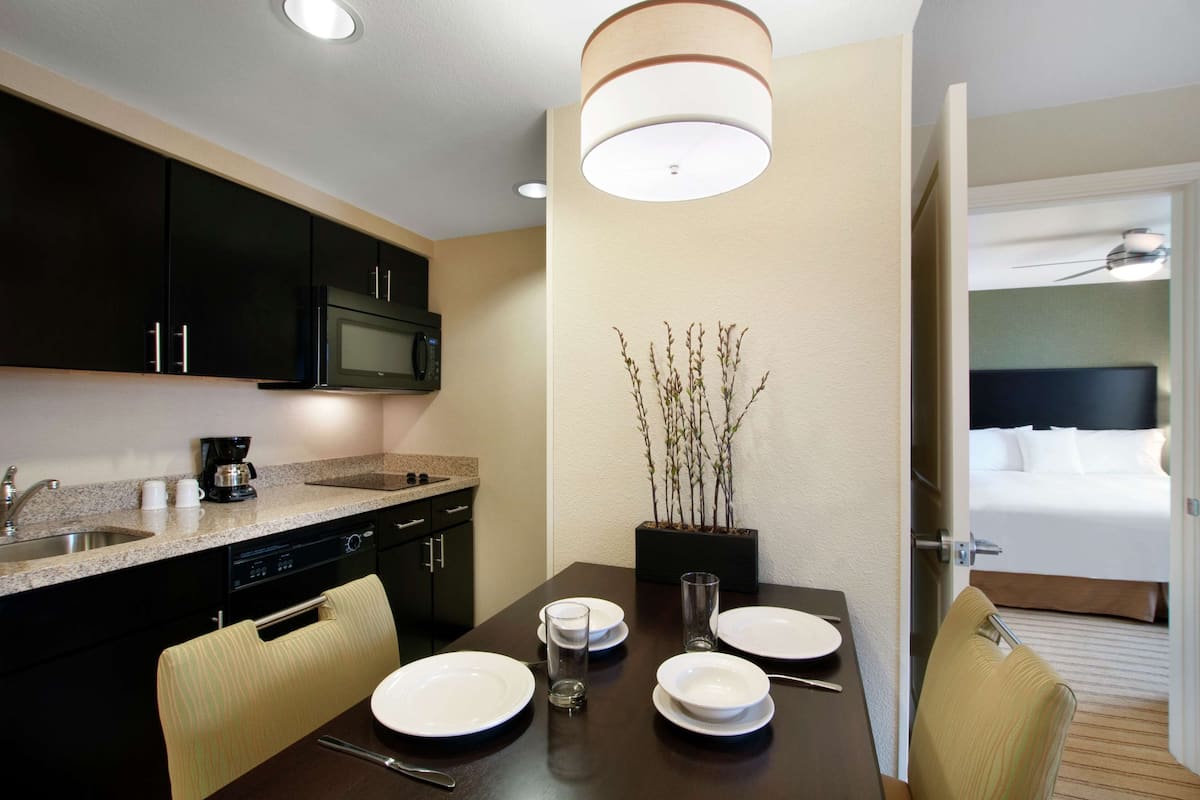 full-sized fridge, microwave, stovetop, coffee/tea maker