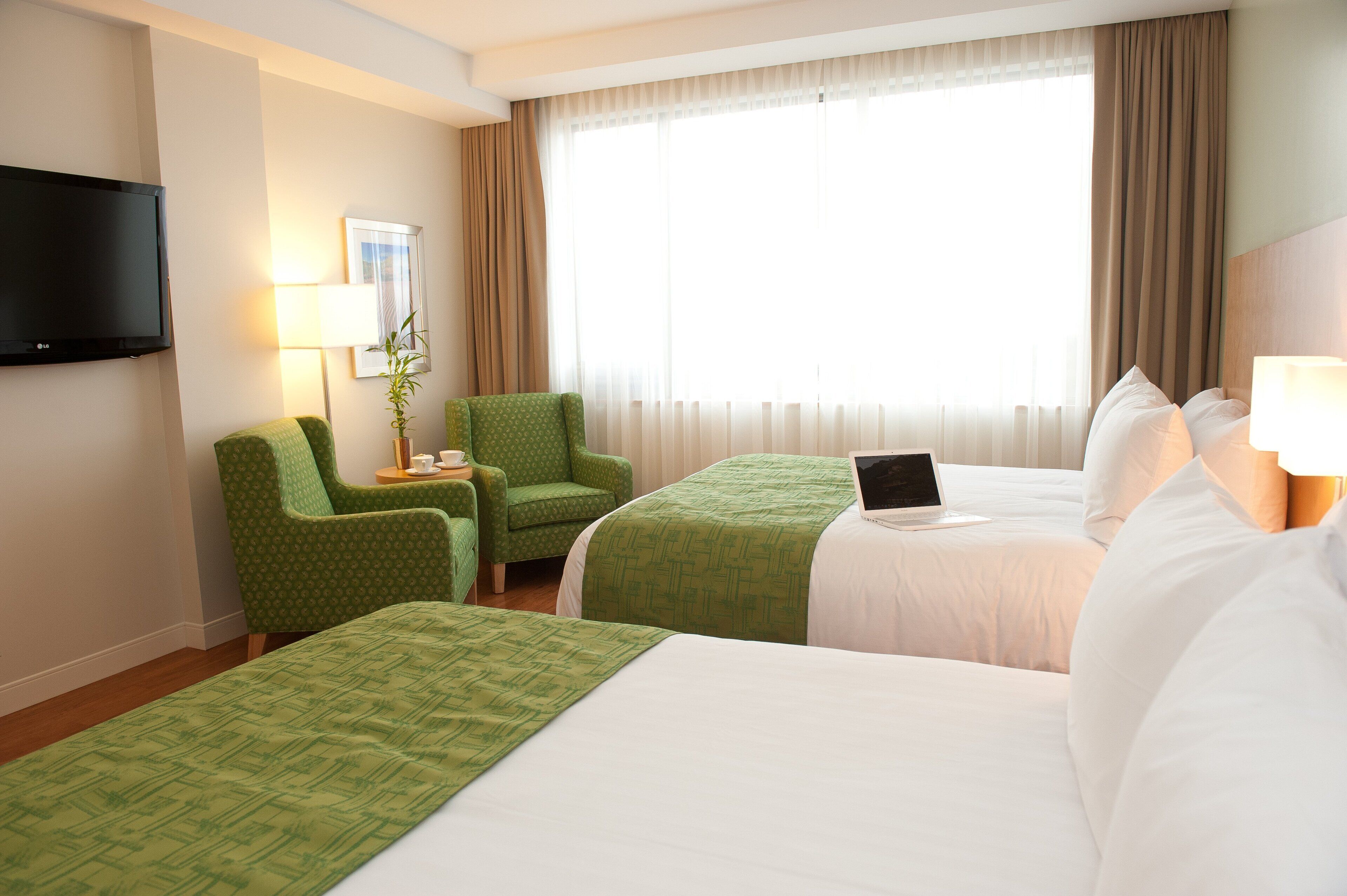 Premium bedding, down duvets, pillow-top beds, in-room safe