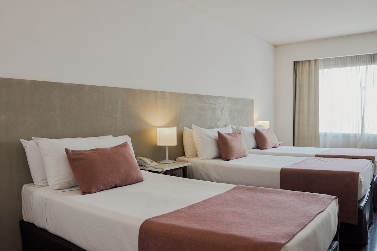 Room, 3 Twin Beds, Non Smoking | Minibar, in-room safe, desk, blackout drapes