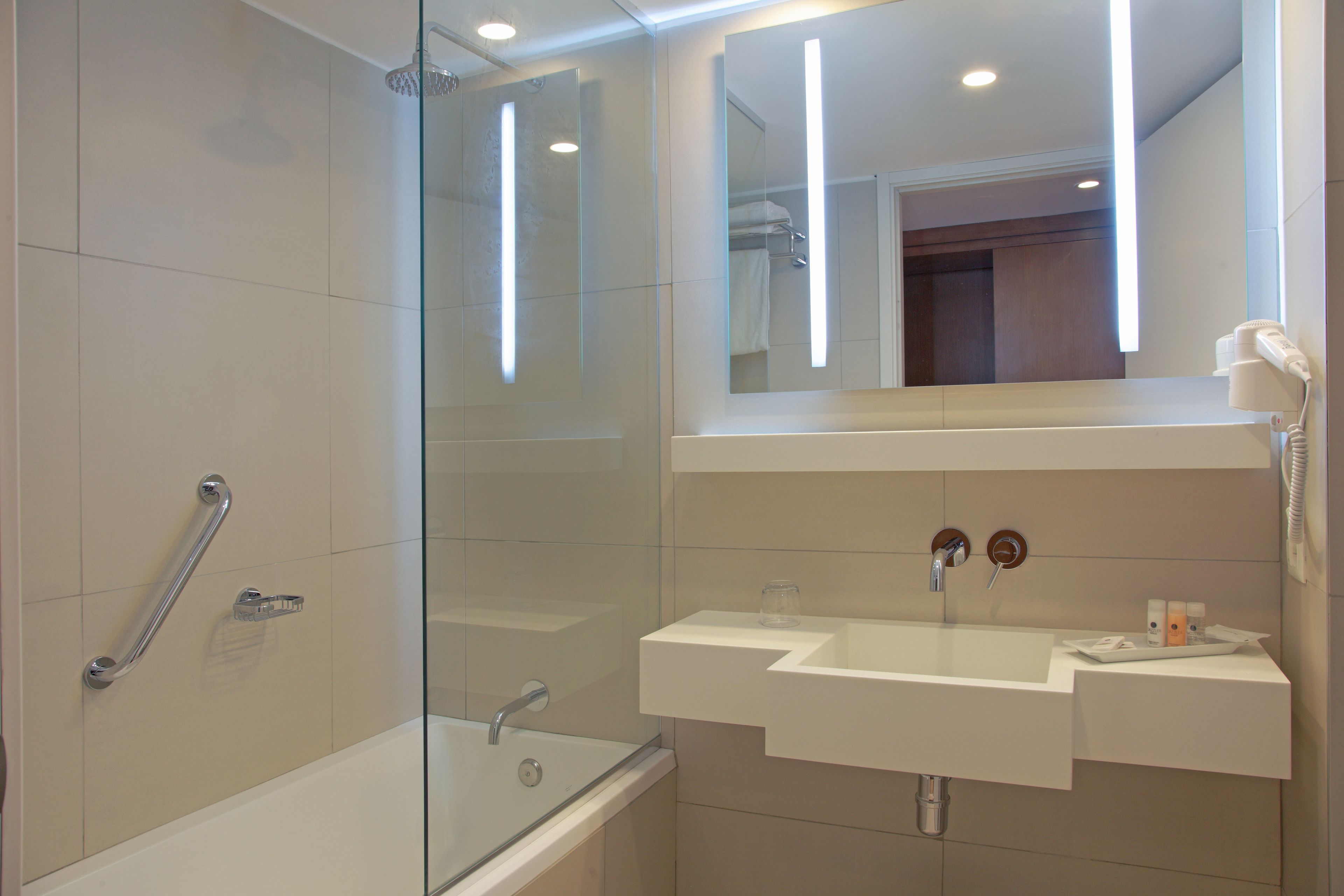 combined shower/bathtub, deep-soaking bathtub, rainfall showerhead