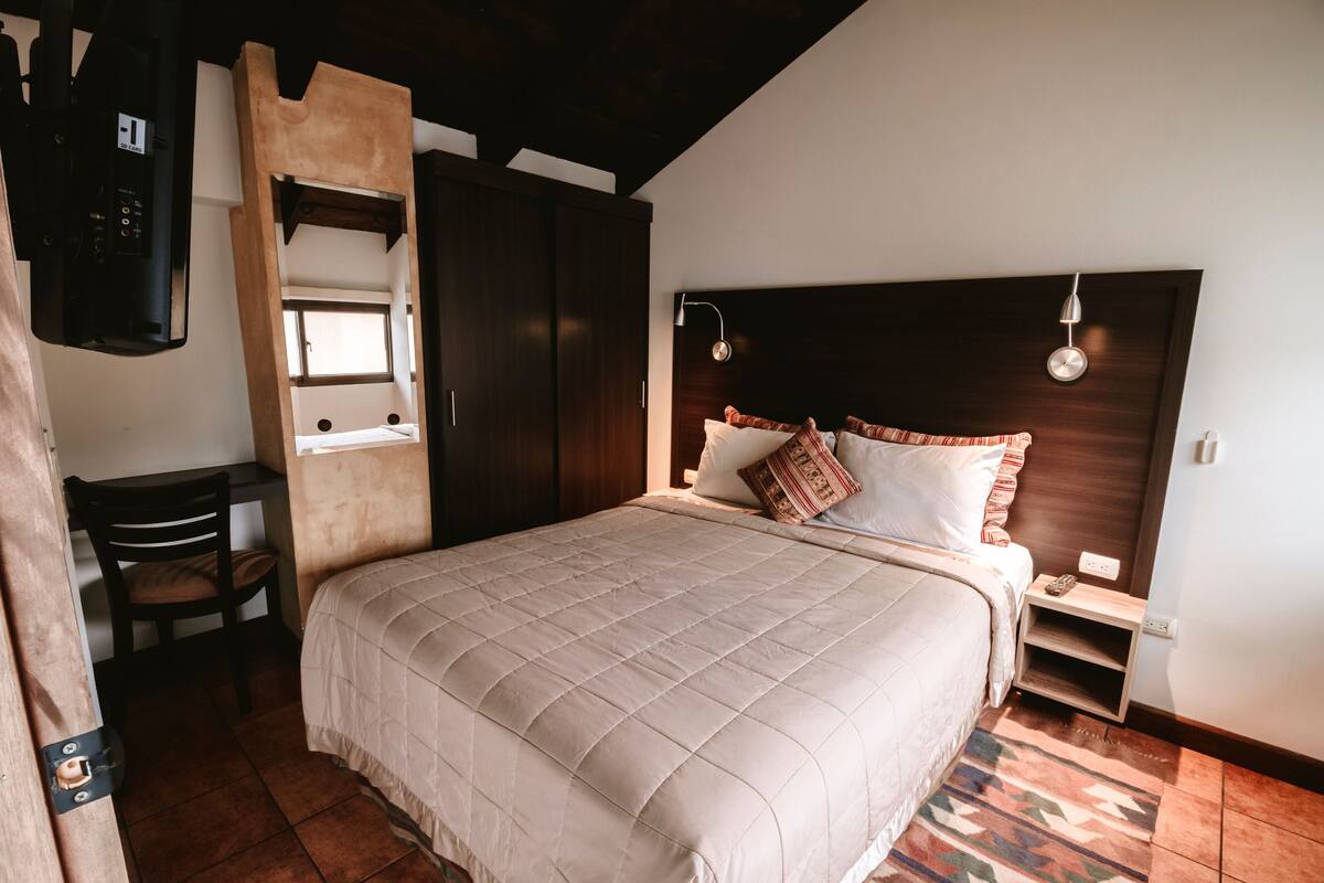 Suite, 2 habitaciones (Dona Luisa) | Edredones de plumas, colchones Select Comfort, caja fuerte