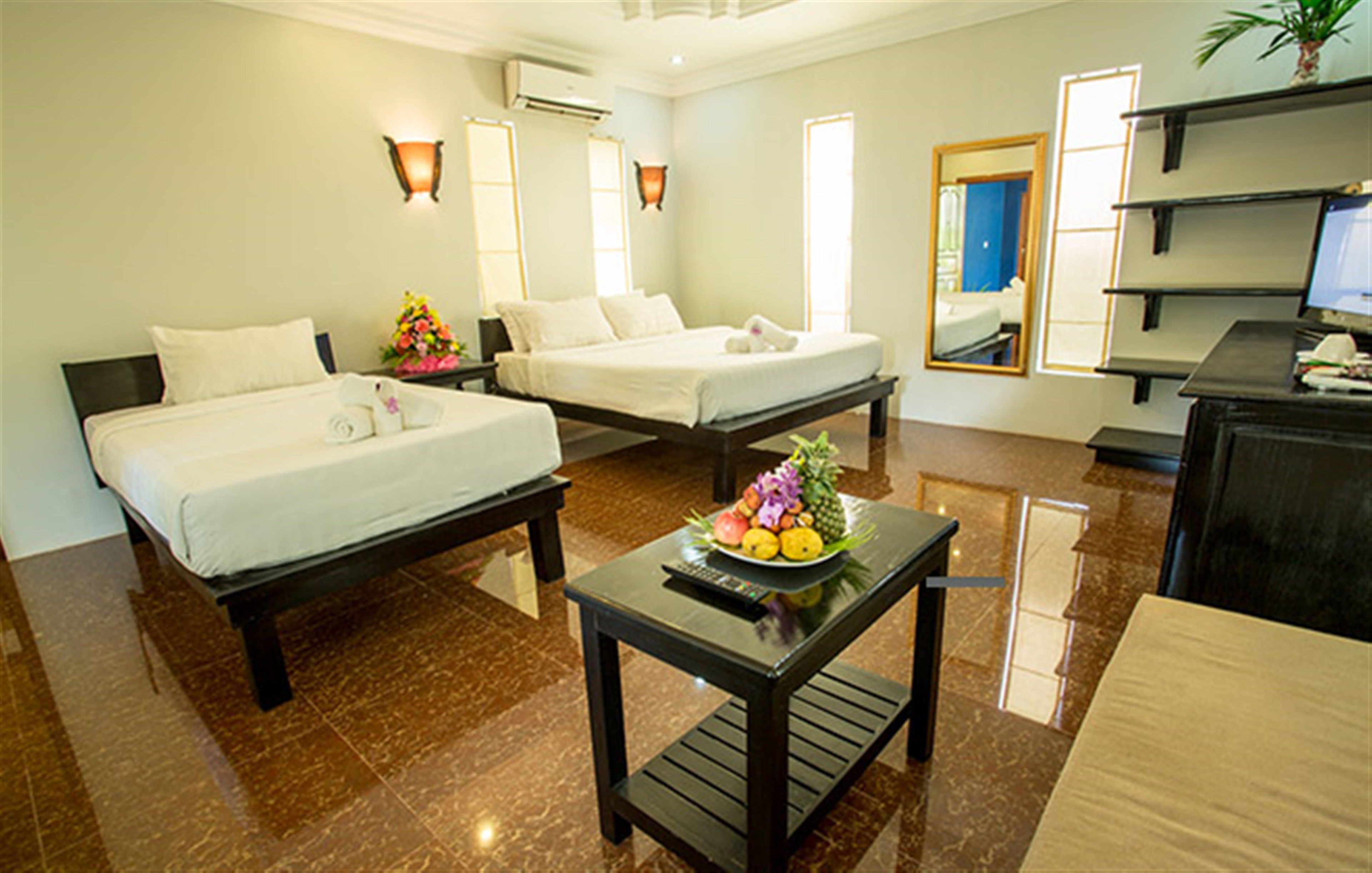 Luxury Bungalow, 1 Bedroom, Garden Area | Minibar, in-room safe, desk, iron/ironing board