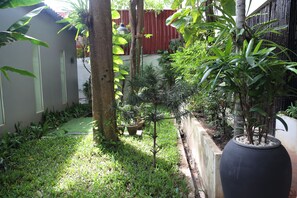 Superior-Zweibettzimmer, 2 Einzelbetten, Gartenblick | Blick auf den Garten
