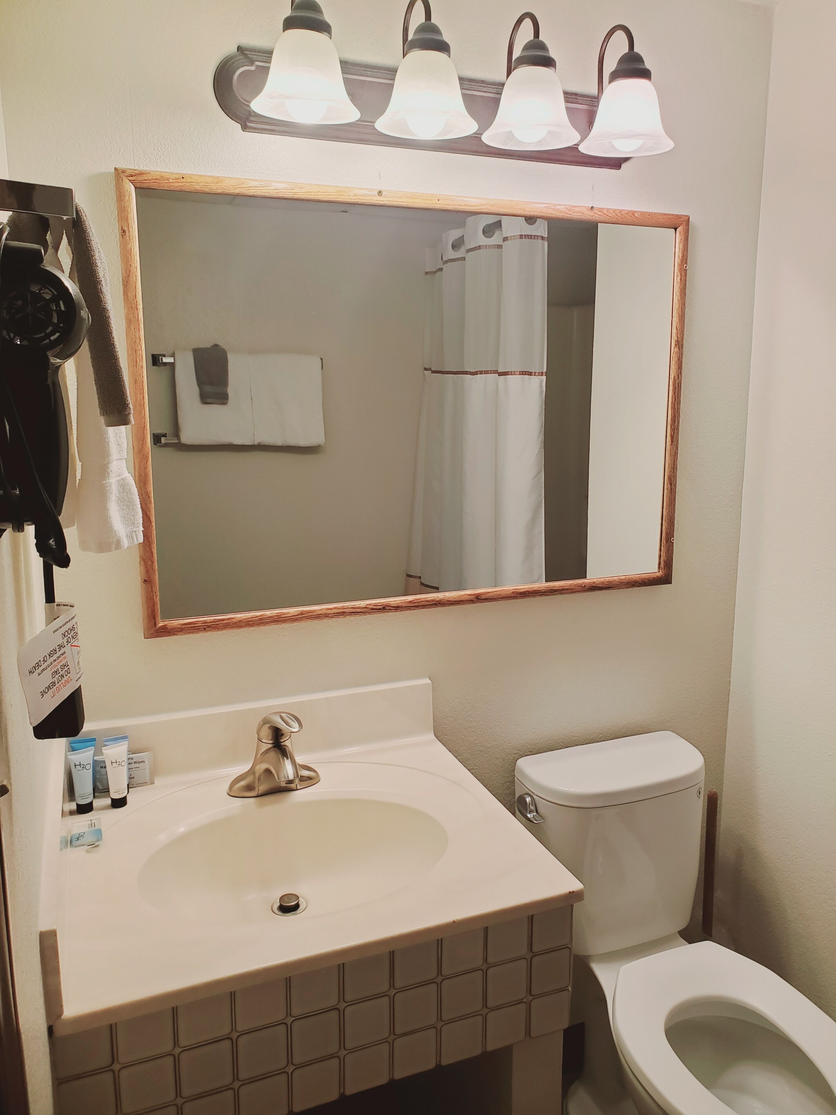 family suite (2 queen) | bathroom | combined shower/bathtub, hair dryer, towels