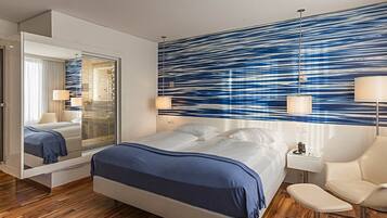 Premium bedding, down comforters, pillowtop beds, minibar