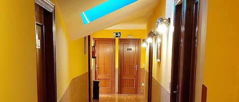 Basic Double or Twin Room | Living area | Flat-screen TV