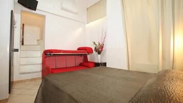 Desk, blackout drapes, soundproofing, rollaway beds