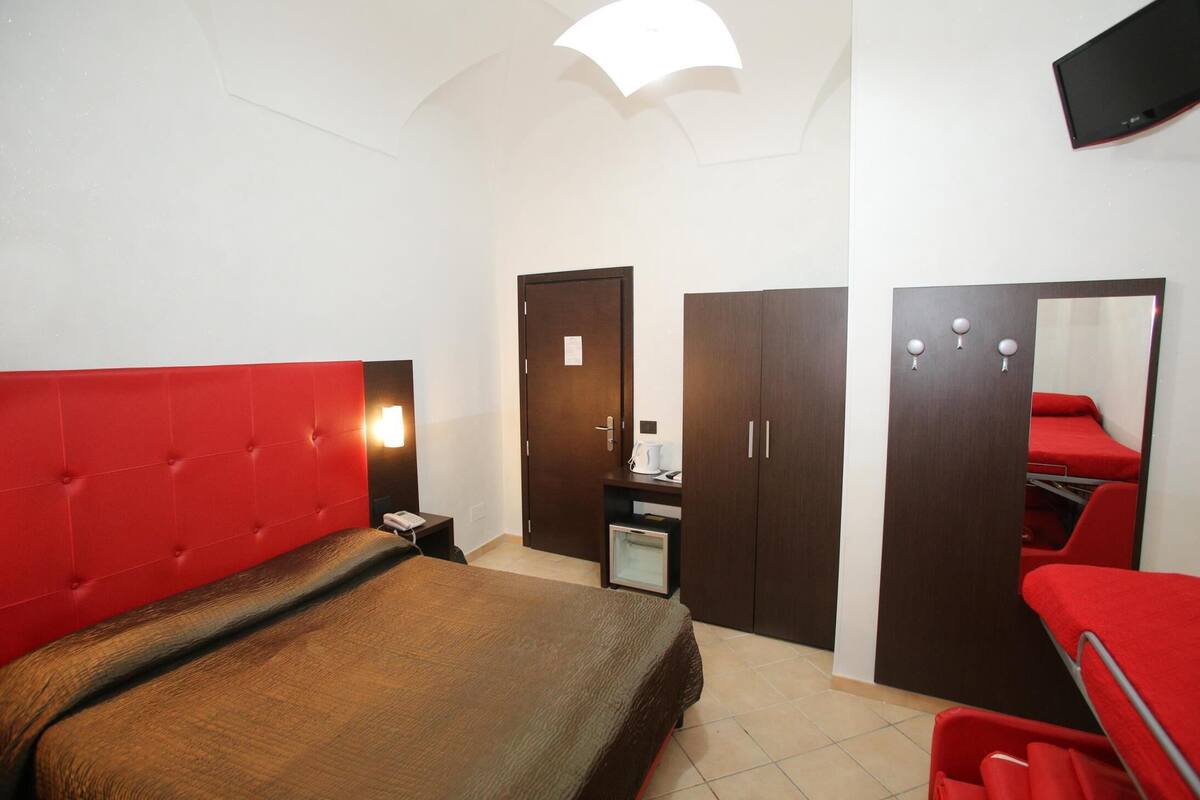 Desk, blackout drapes, soundproofing, rollaway beds