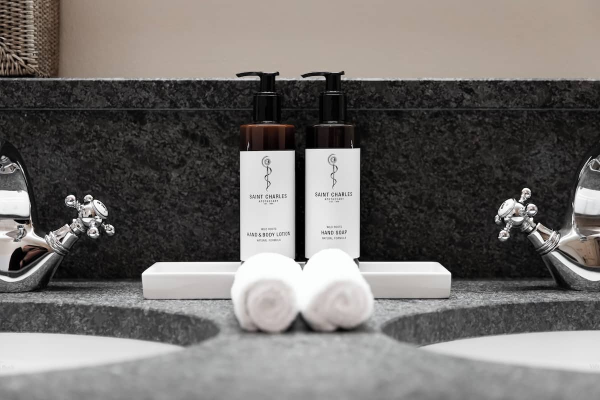 separate bathtub and shower, rainfall showerhead, hair dryer, bathrobes