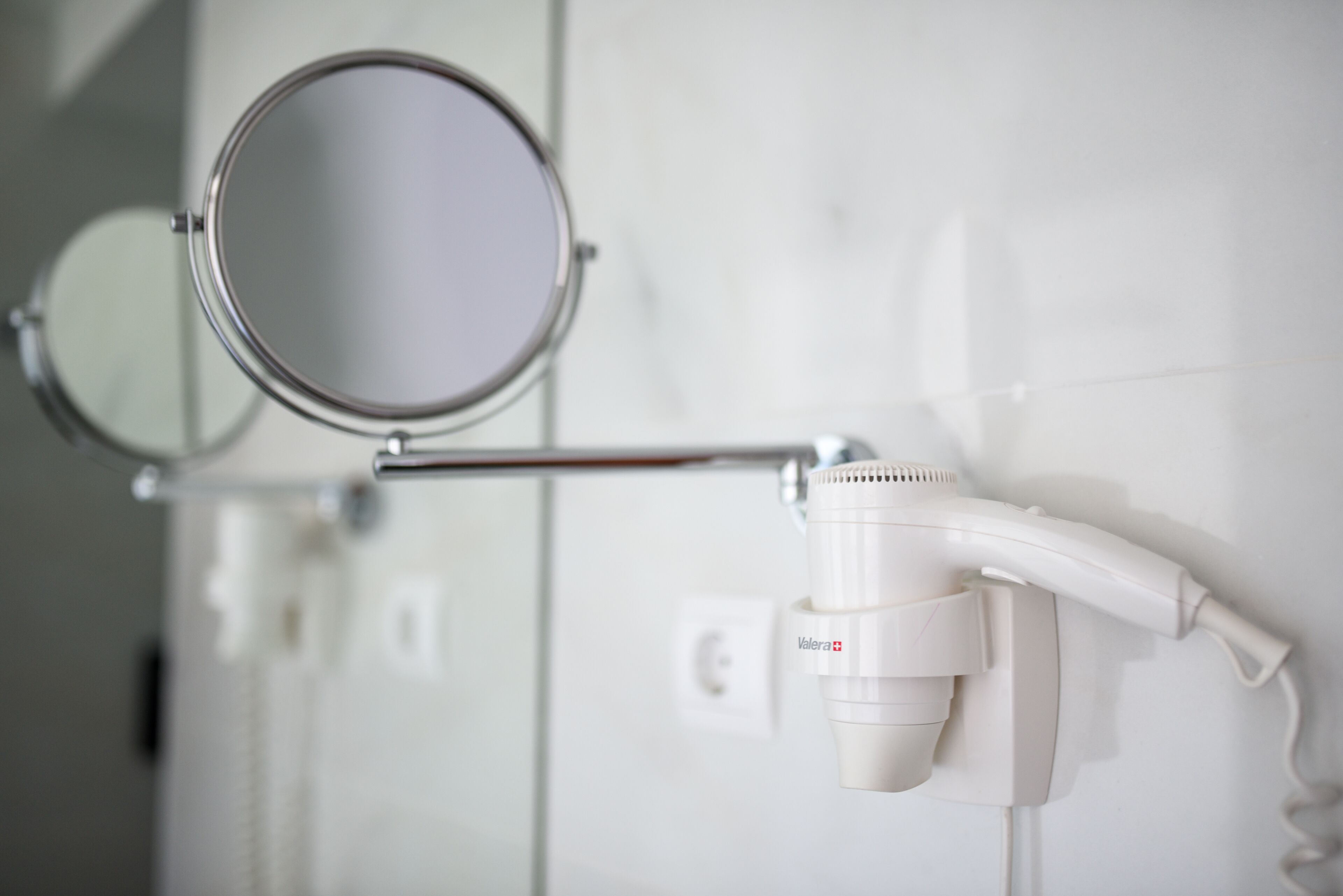 shower, rainfall showerhead, hair dryer, towels