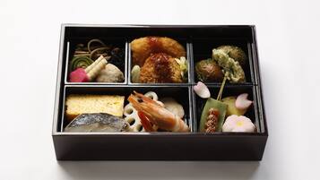 A black box containing various food items.