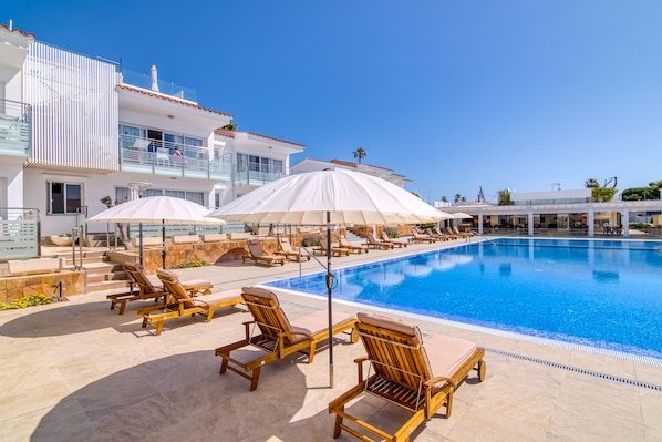 Outdoor pool, pool umbrellas, pool loungers
