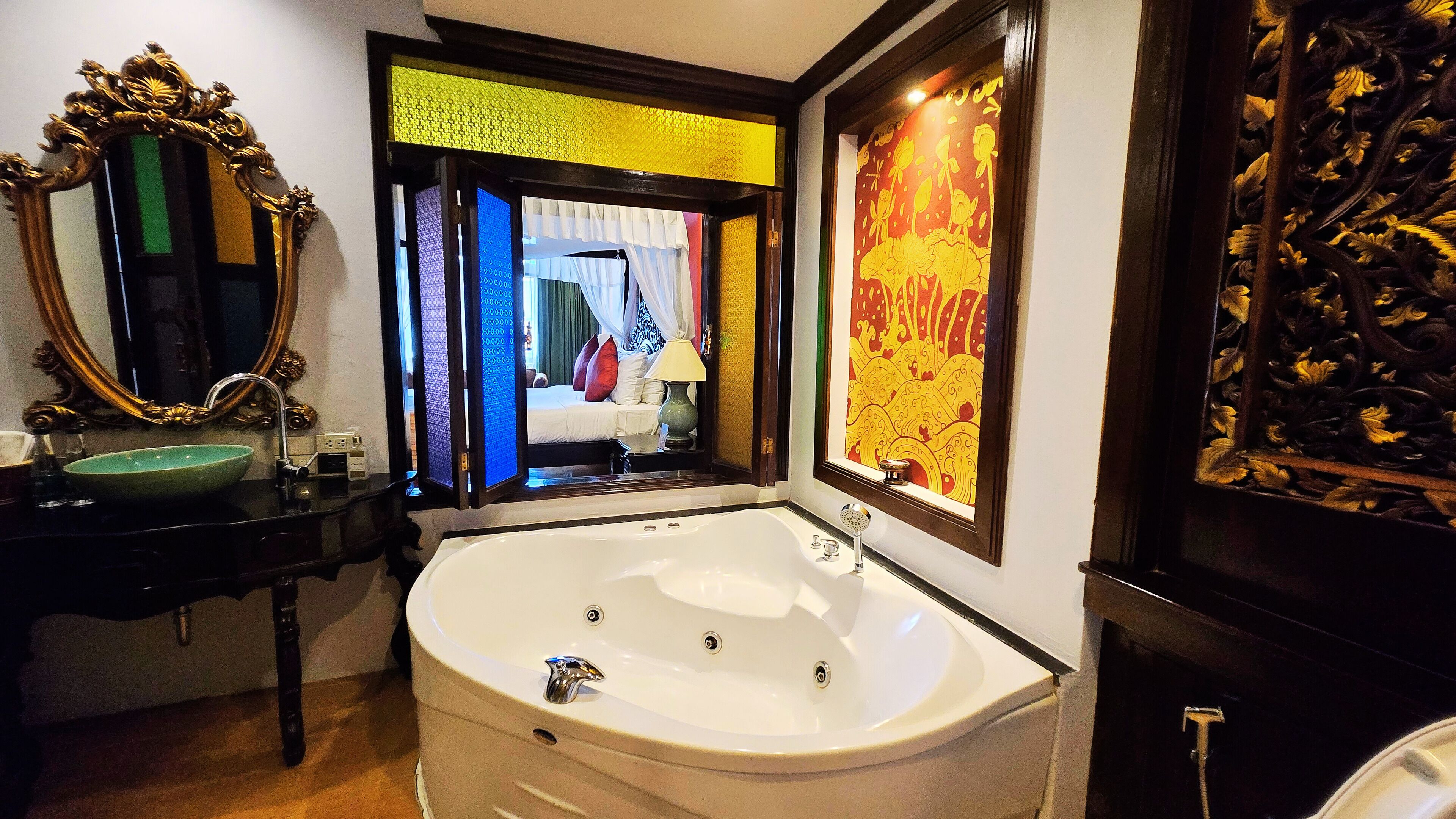 lanna deluxe suite king bed with spa bath | premium bedding, in-room safe, blackout curtains, iron/ironing board