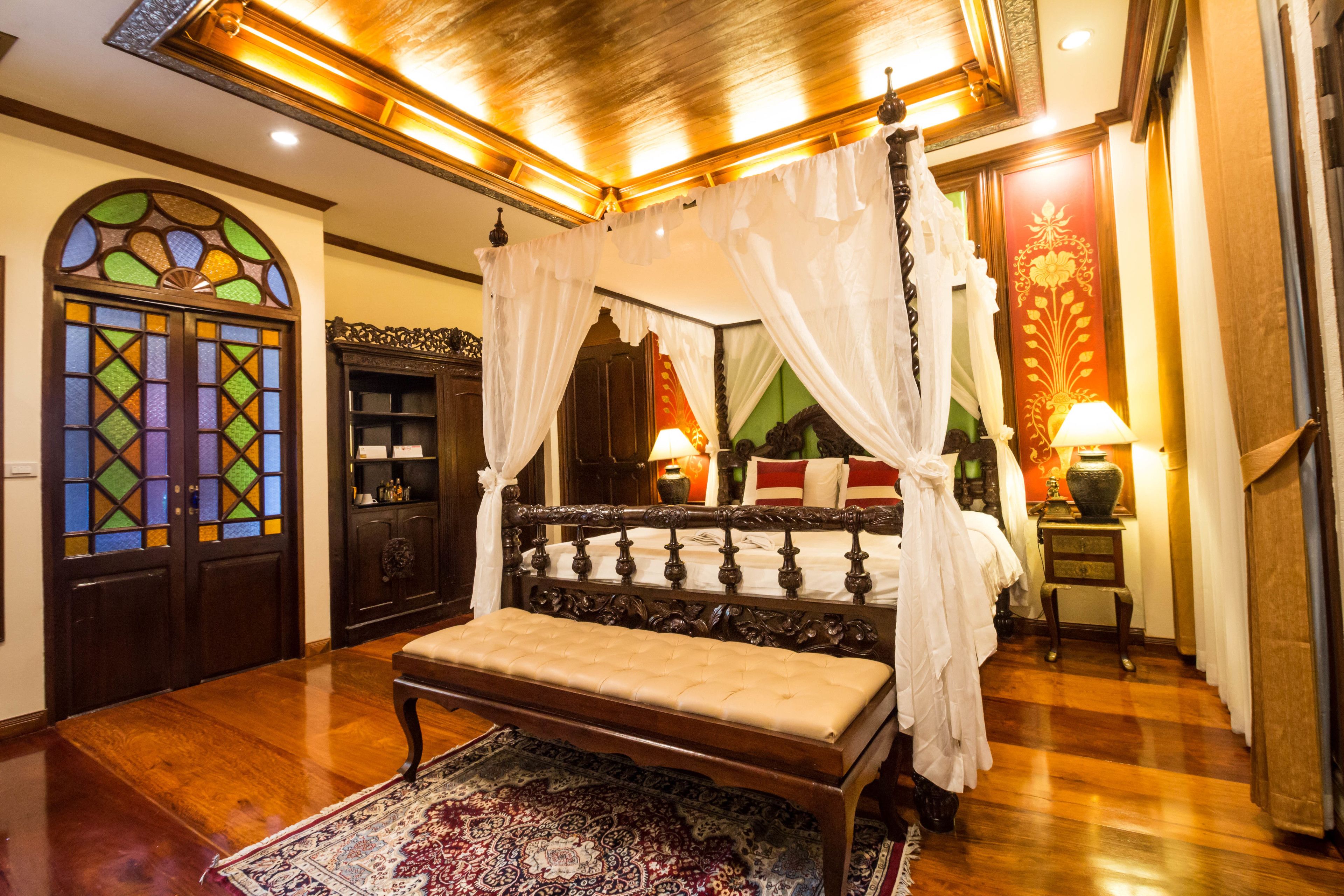 lanna deluxe suite king bed with spa bath | premium bedding, in-room safe, blackout curtains, iron/ironing board