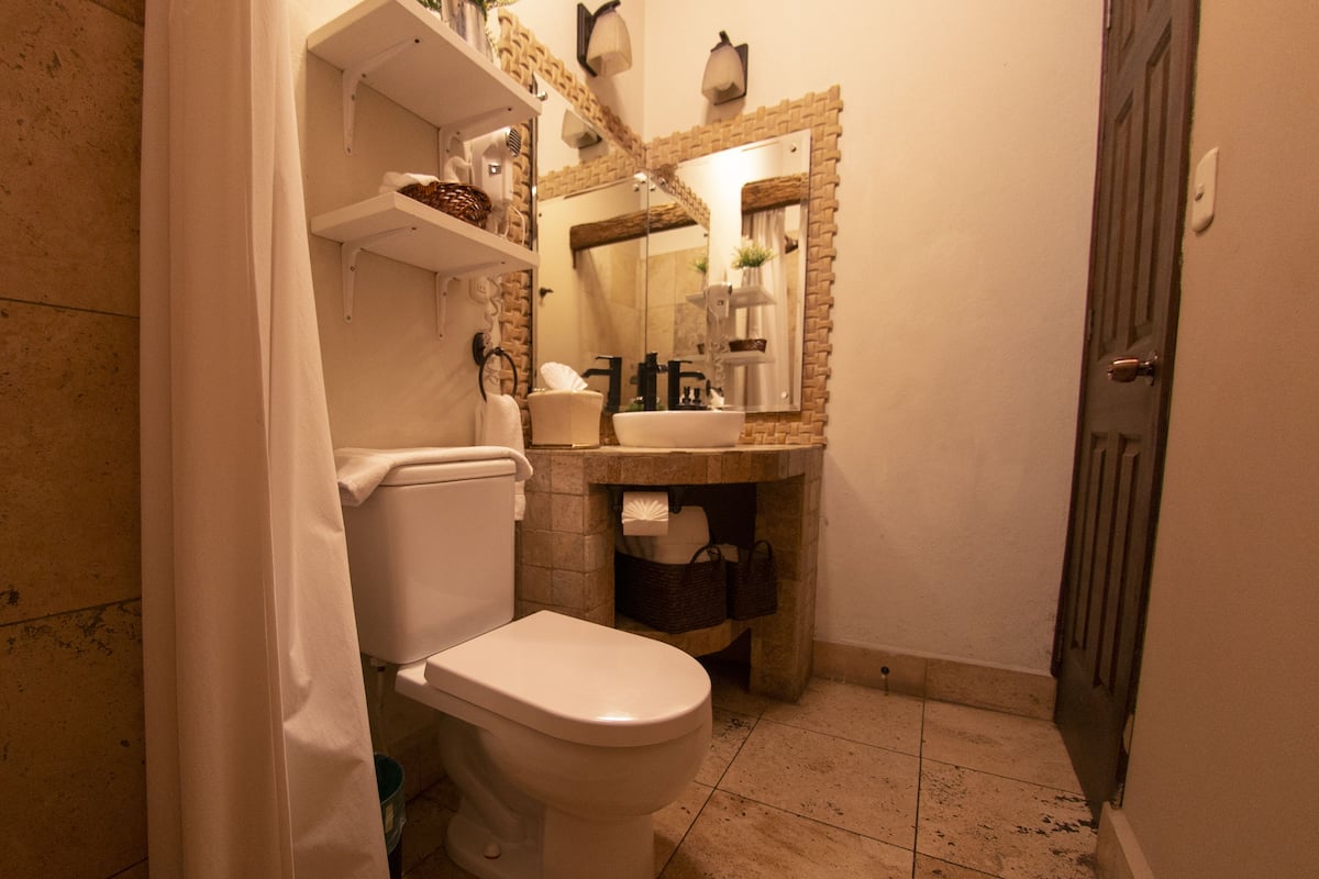 standard room, 1 queen bed | bathroom | shower, rainfall showerhead, designer toiletries, hair dryer