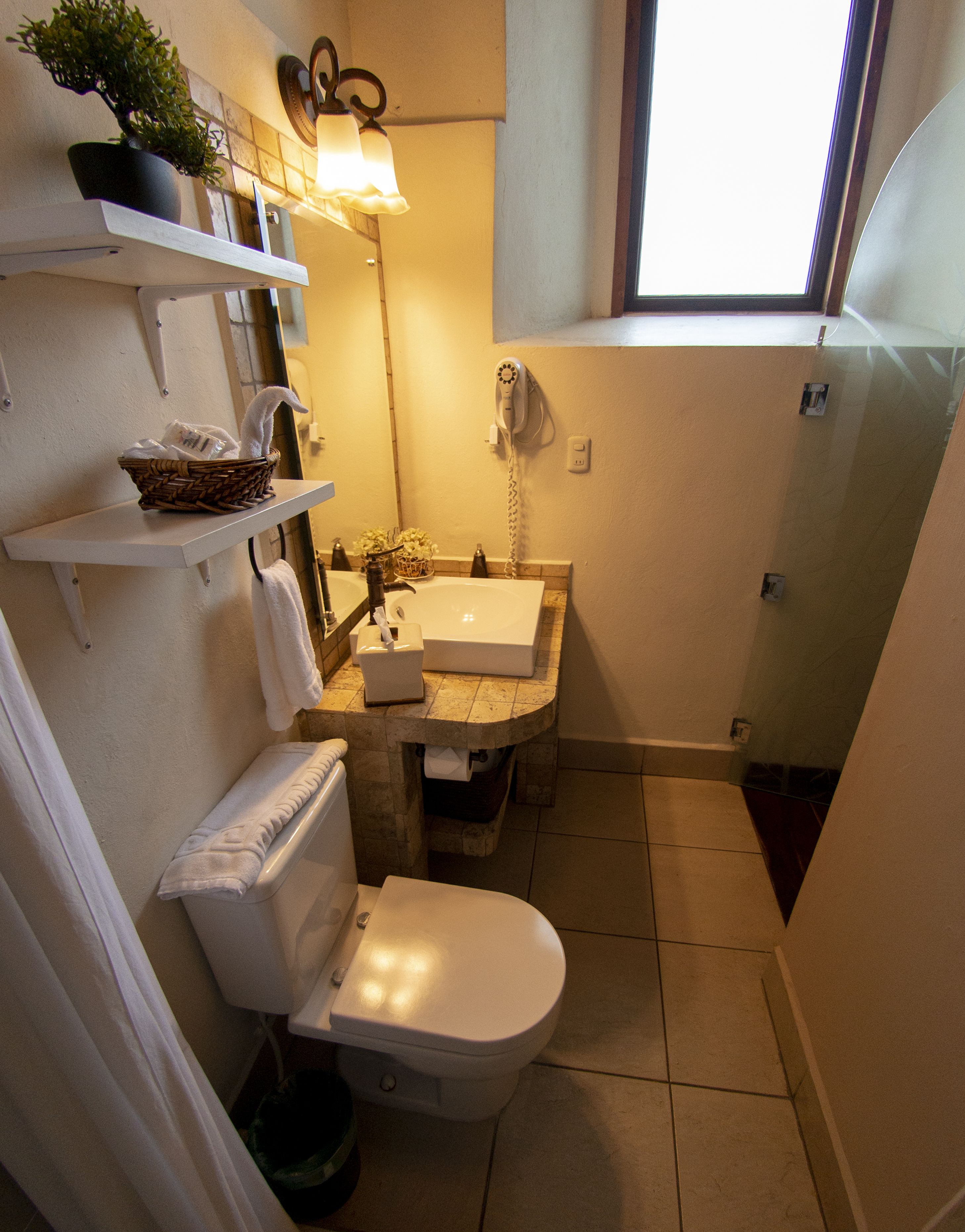 superior room, 1 king bed | bathroom | shower, rainfall showerhead, designer toiletries, hair dryer