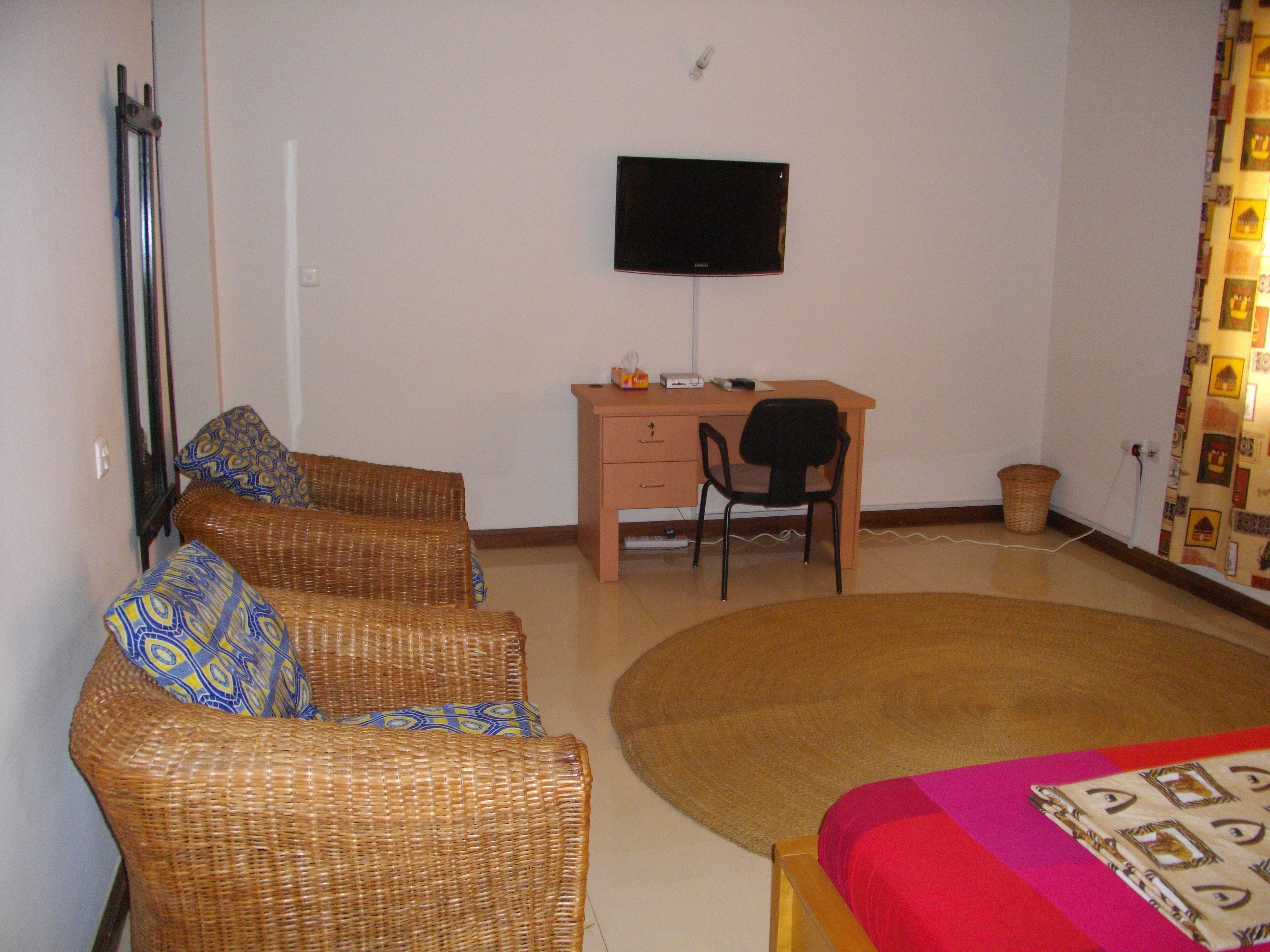 deluxe room | living area | tv