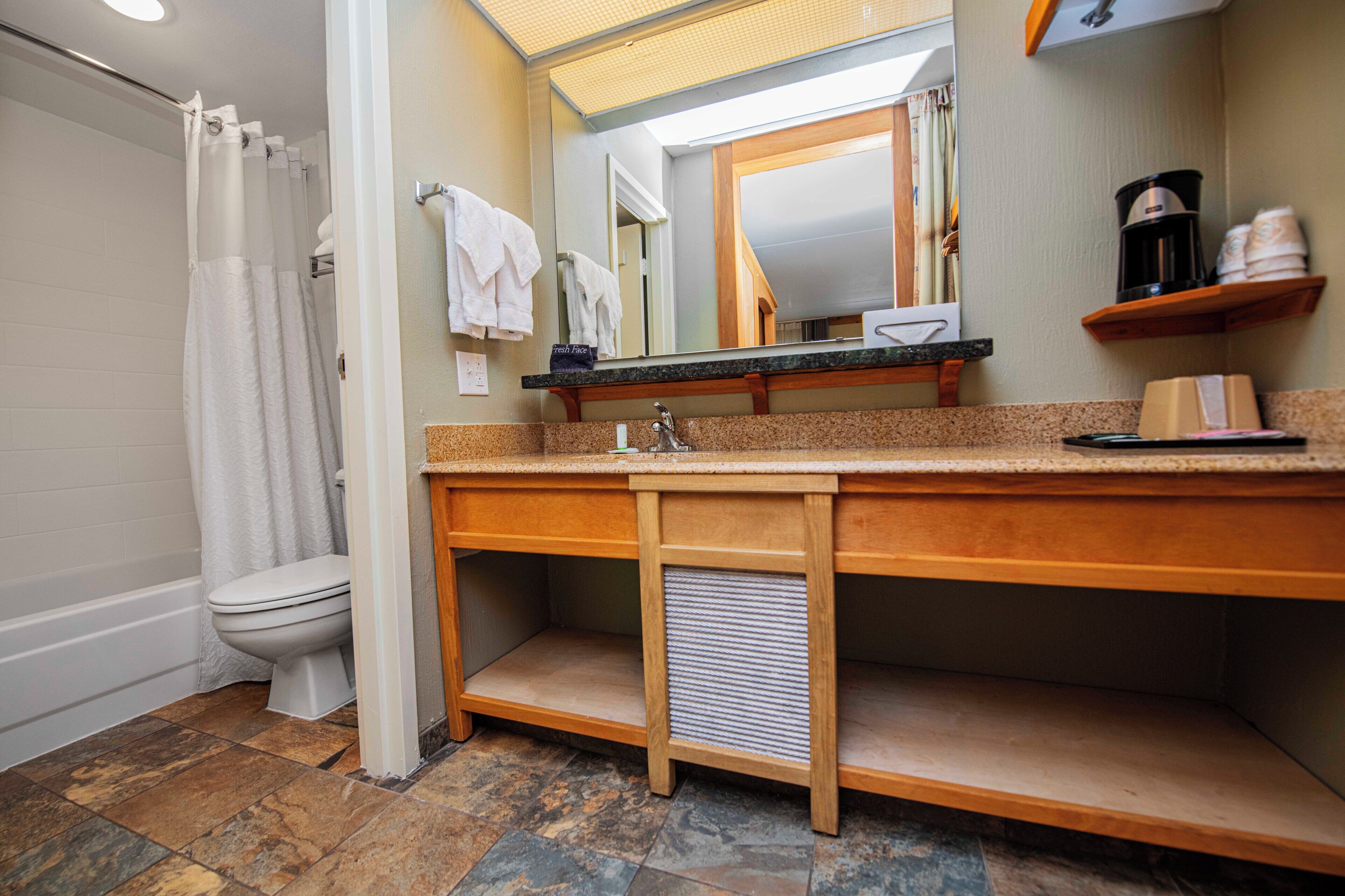 combined shower/bathtub, free toiletries, hair dryer, towels