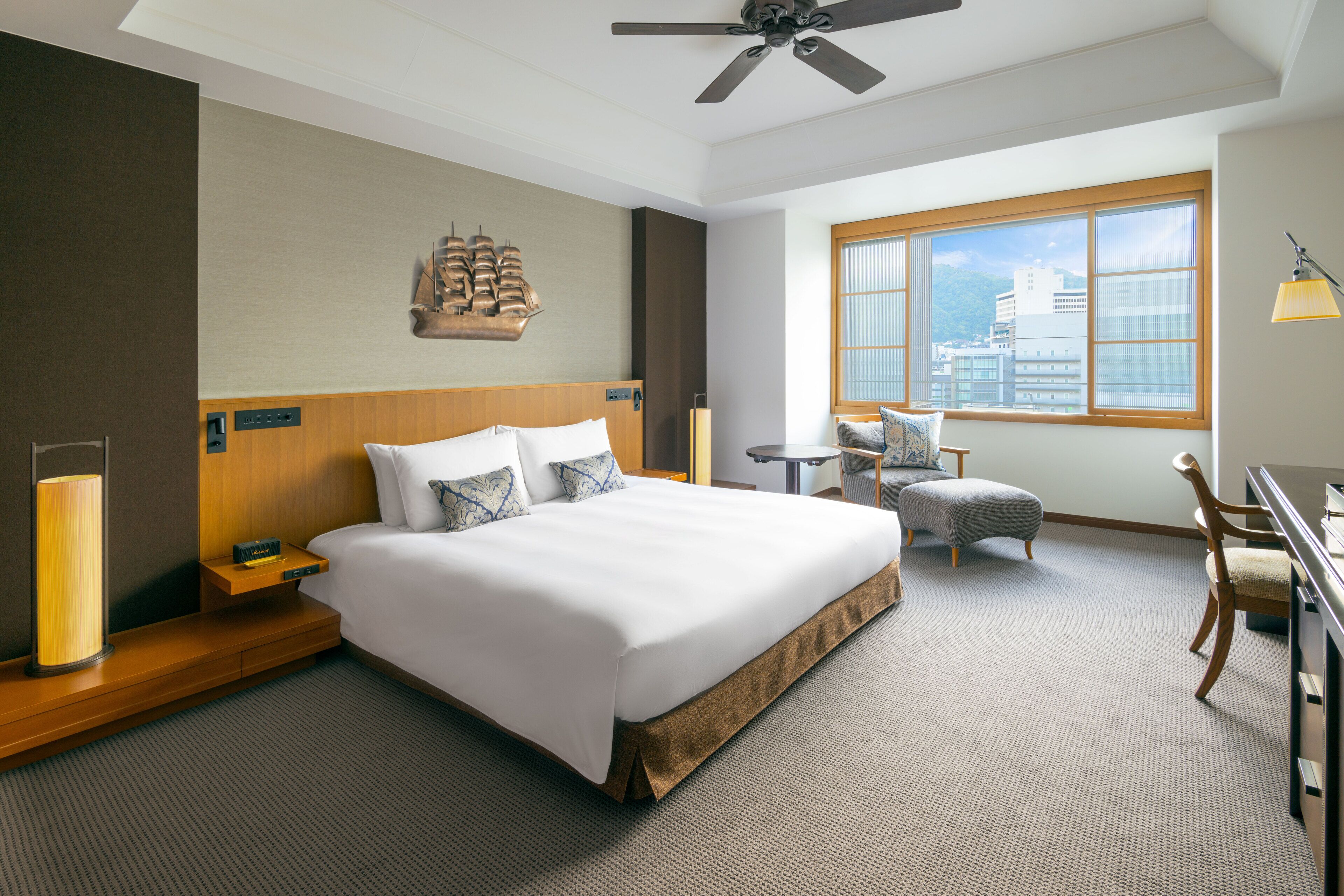 Premium bedding, down comforters, in-room safe, desk