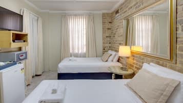 Budget Twin Room, Shared Bathroom | Minibar, in-room safe, iron/ironing board, free WiFi