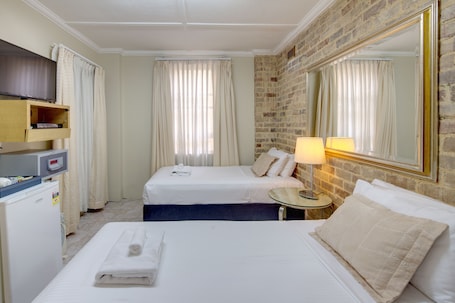 Budget Twin Room, Shared Bathroom | Minibar, in-room safe, iron/ironing board, free WiFi