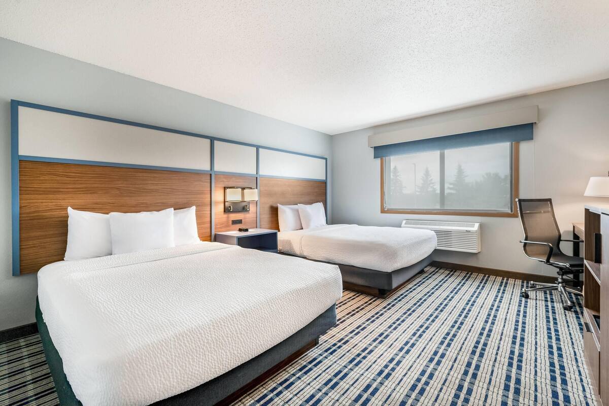 Room, 2 Queen Beds, Non Smoking | Down comforters, desk, laptop workspace, blackout drapes
