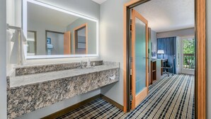 Suite, 2 Queen Beds, Non Smoking | Bathroom | Free toiletries, hair dryer (on request), towels, soap - AmericInn by Wyndham Baudette (Baudette)