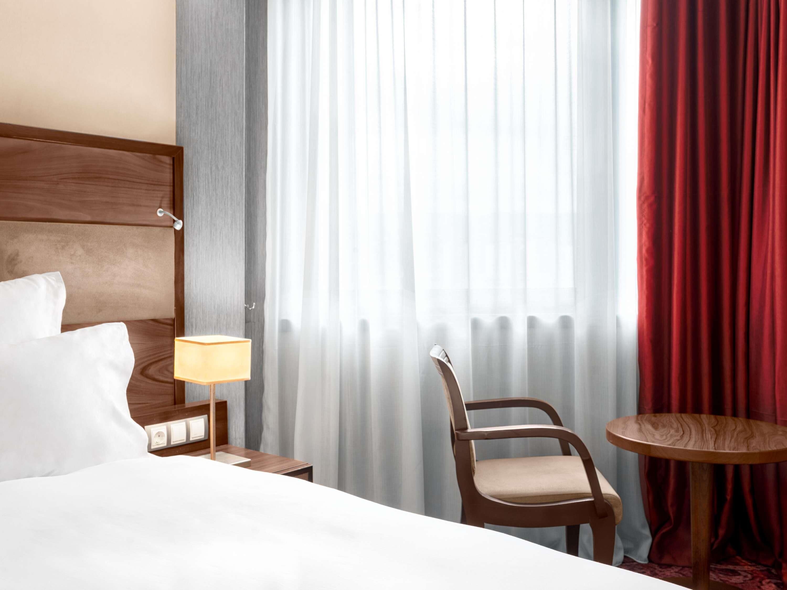 Deluxe Twin Room, Multiple Beds | Minibar, in-room safe, desk, soundproofing