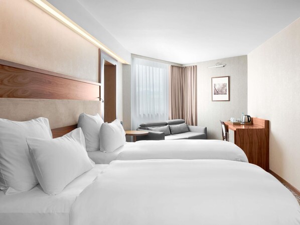 Deluxe Twin Room (King size or twin beds and extra sofa) | Minibar, in-room safe, desk, soundproofing -  Movenpick hotel Sarajevo (Sarajevo)