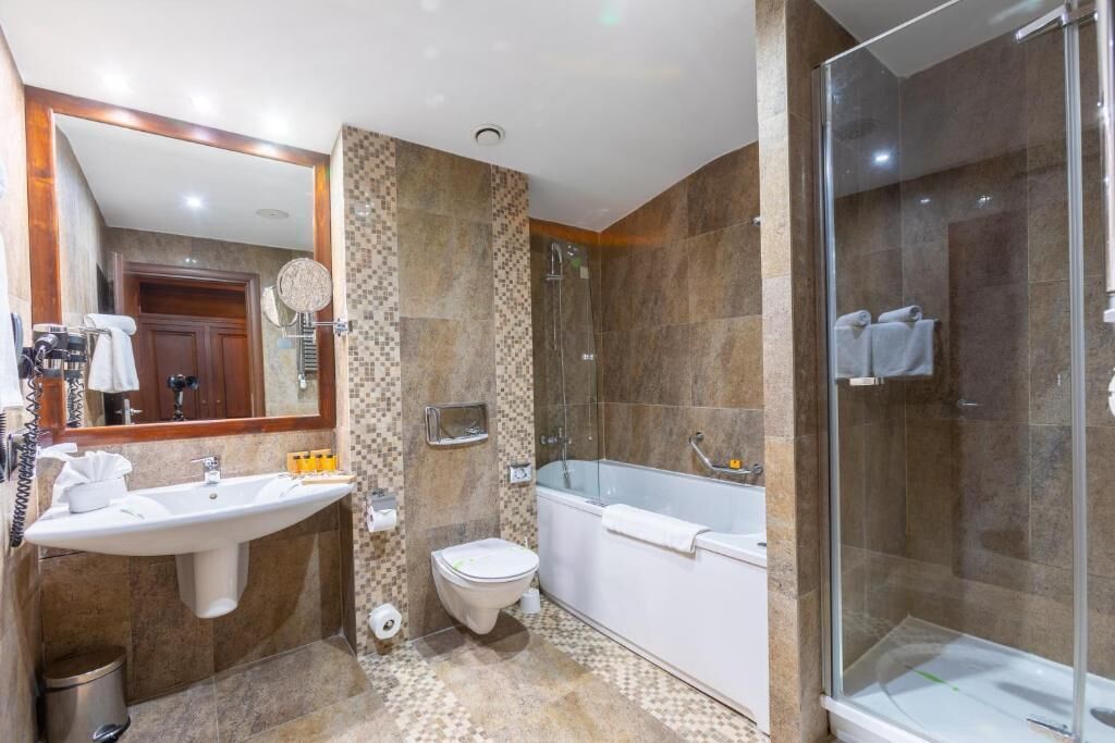 presidential apartment | bathroom | deep-soaking bathtub, free toiletries, hair dryer, bathrobes