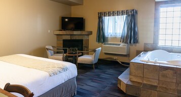 Suite, 1 King Bed, Jetted Tub | Free WiFi, bed sheets