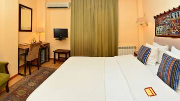 Premium bedding, down comforters, pillowtop beds, minibar
