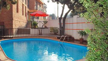 Outdoor pool, pool umbrellas