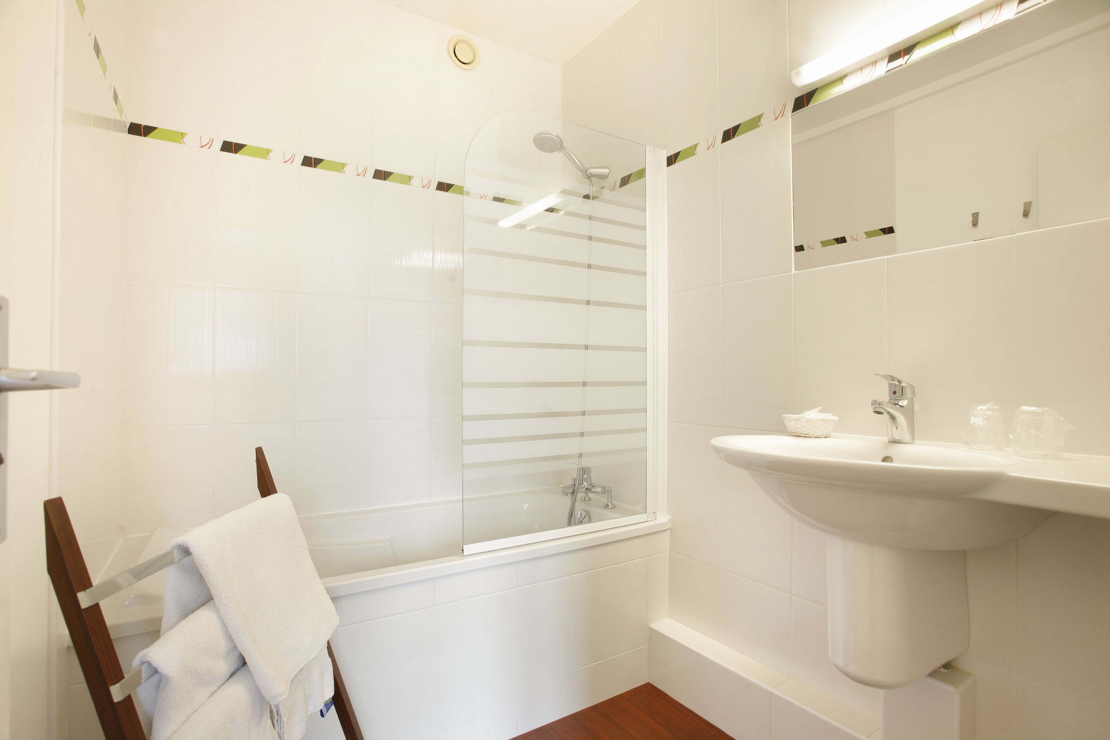 superior double room | bathroom | hair dryer, towels