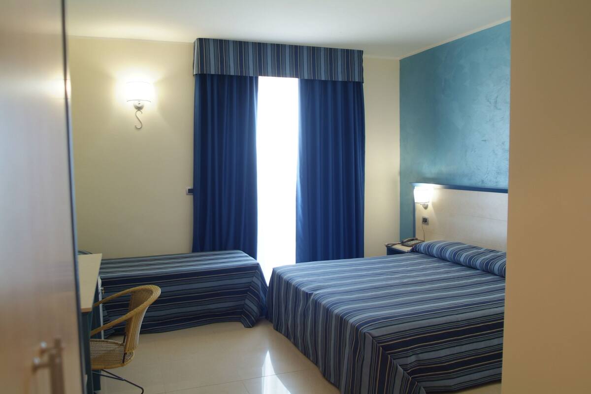 Triple Room | Frette Italian sheets, Select Comfort beds, minibar, in-room safe