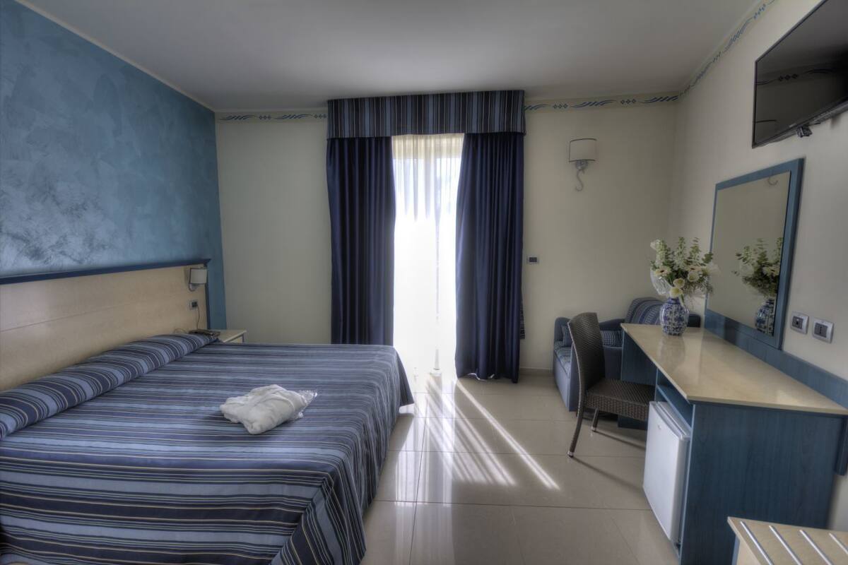 Double Room | Frette Italian sheets, Select Comfort beds, minibar, in-room safe