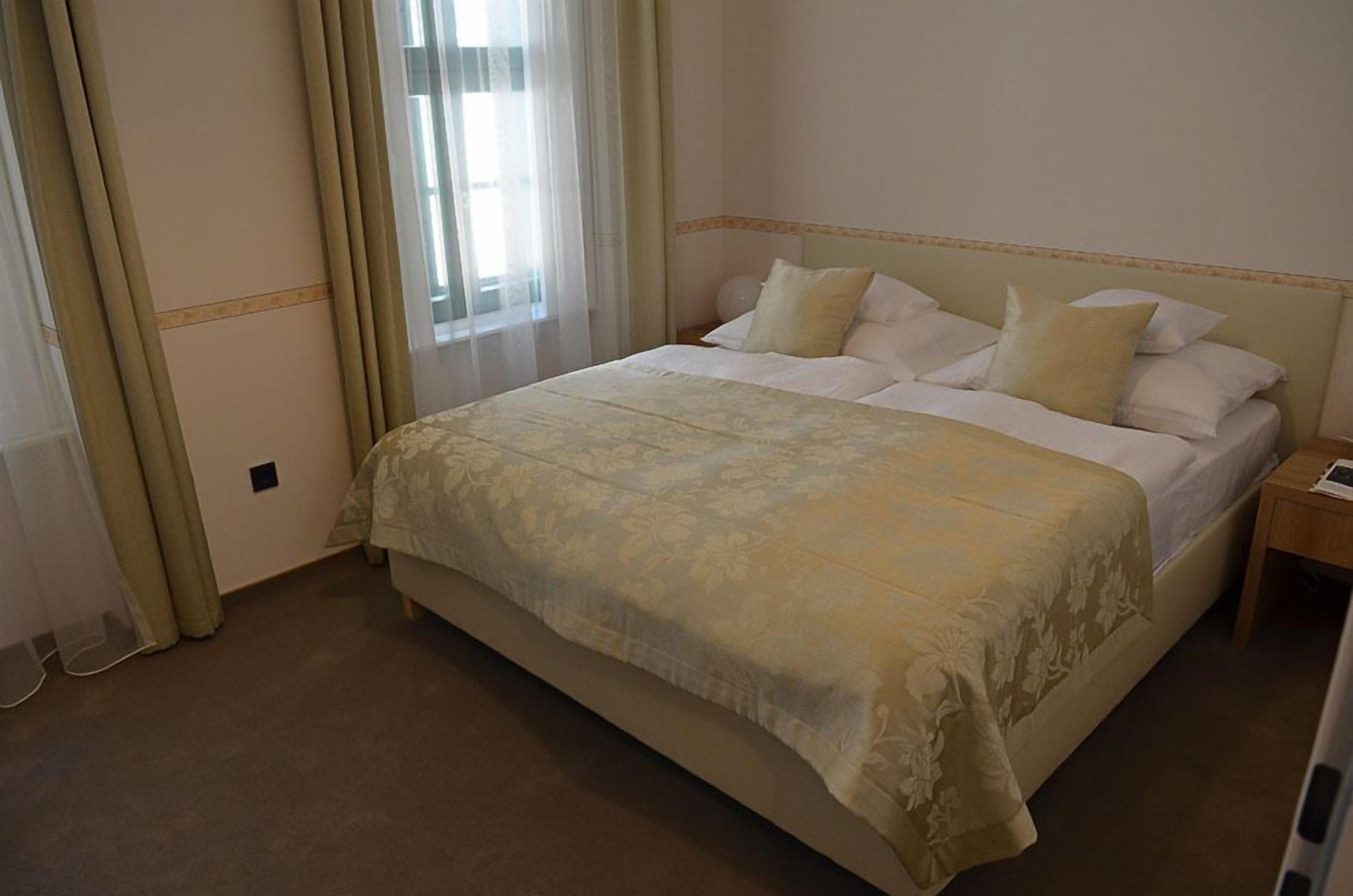 premium bedding, down duvets, minibar, in-room safe