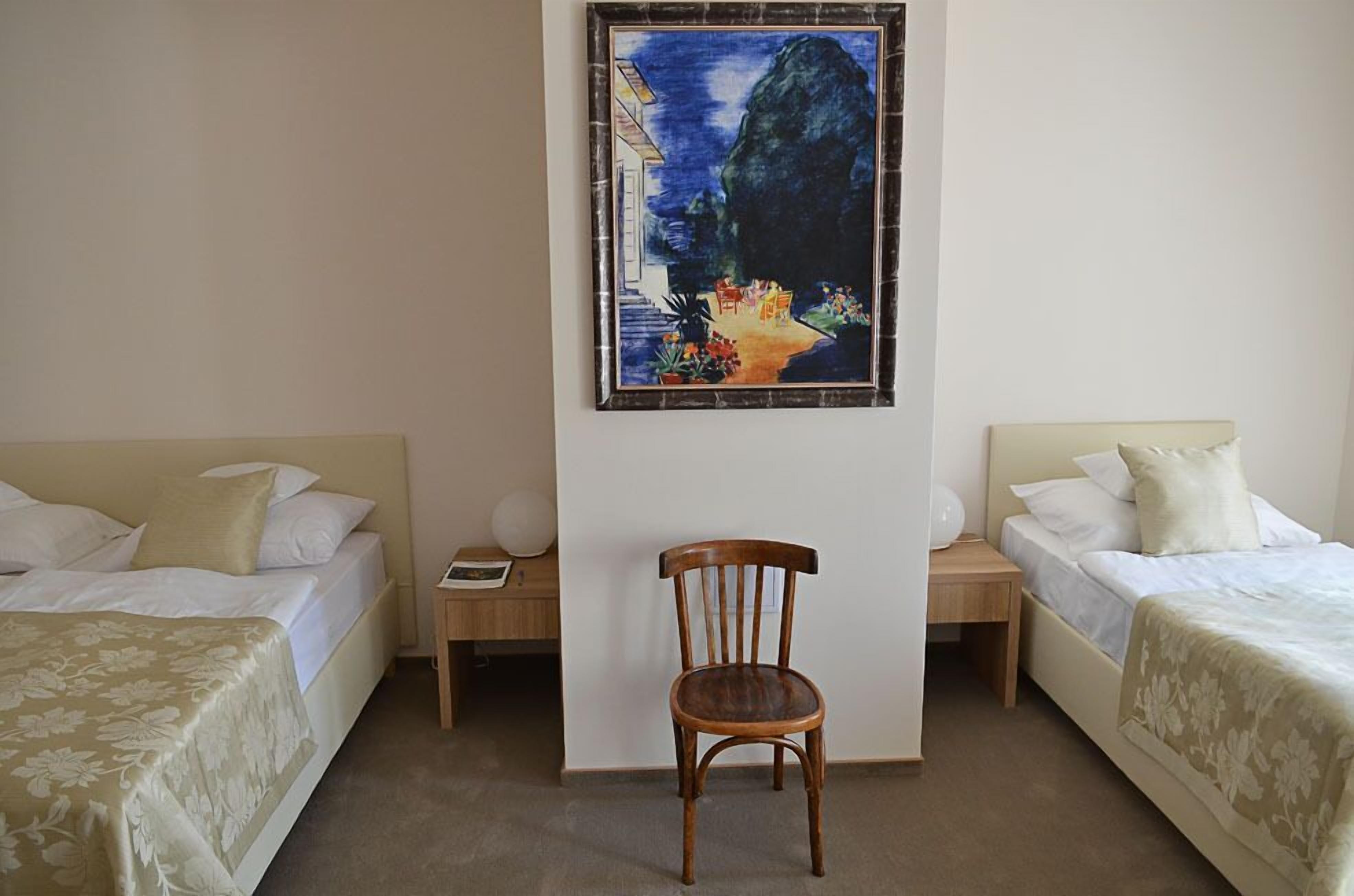 premium bedding, down duvets, minibar, in-room safe